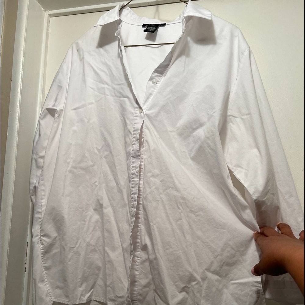 White slightly high-low blouse
